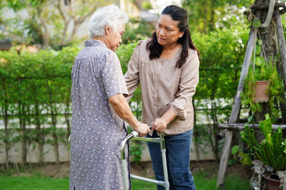 Compassionate caregiver assisting senior in Brooklyn, NY