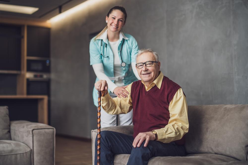 Senior man in Manhattan receiving home healthcare massage